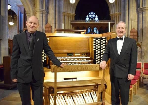 Jonathan Wallace and Paul Hale by the Sir Malcolm Sargent Memorial Organ in St Mary's Church PHOTO: Supplied
