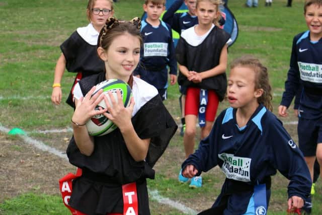 Melton tag rugby festival action EMN-180310-161241002
