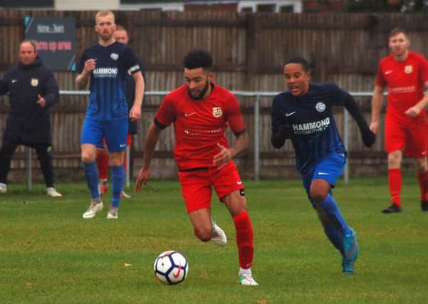 Melton Town gave a debut to former Lincoln City star Nathan Arnold against Lutterworth EMN-180810-102941002