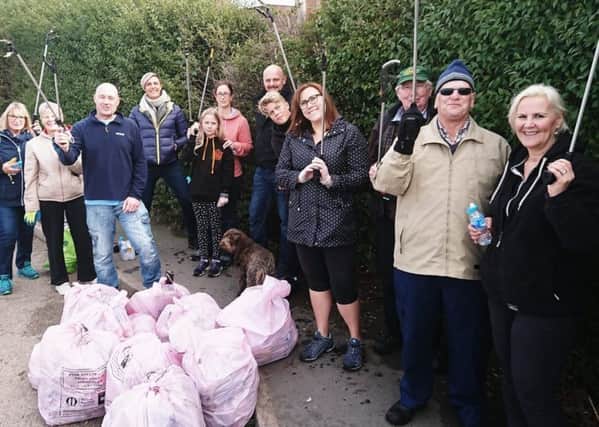 Volunteers who turned for a Melton Matters litter pick in the Leicester Road area of the town EMN-180810-171138001