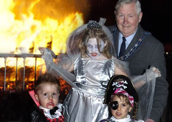 Melton Town Estate senior town warden John Southerington with fancy dress winners PHOTO: Tim Williams