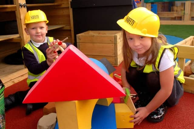 Swallowdale Primary School pupils spend time in the builders' yard at the new Â£30,000 outdoor learning centre EMN-181210-103550001