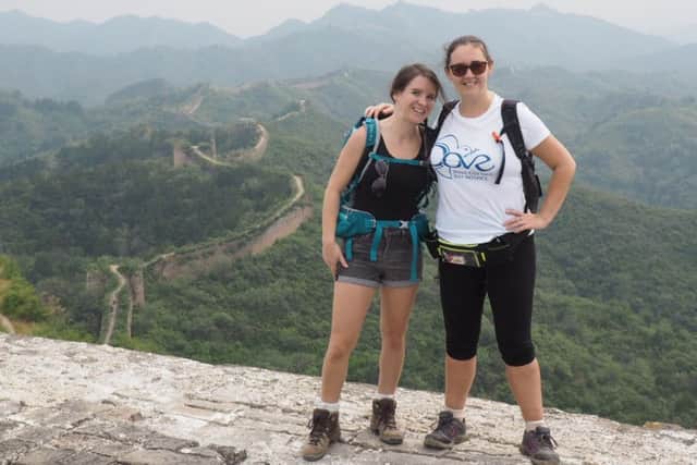 Victoria Goldstein and Ria Prior climbing the Great Wall of China PHOTO: Supplied