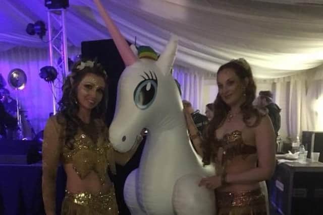 Entertainers with a giant unicorn at the Enchanted Faeryball PHOTO: Supplied