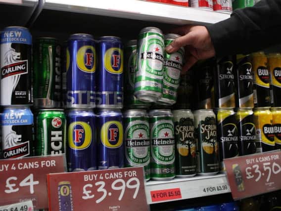 Supermarkets can challenge you for ID if they think you are younger than 25. Picture: David Cheskin/PA Wire