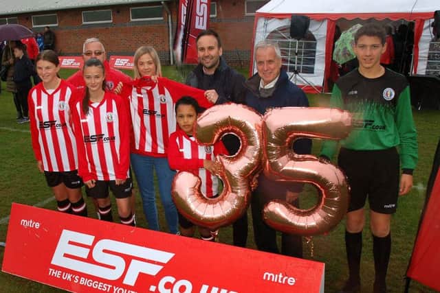 Sponsor Russell Young from ESF Events, hands over the new shirts to Rangers secretary Danielle Moore and players EMN-181019-172956002