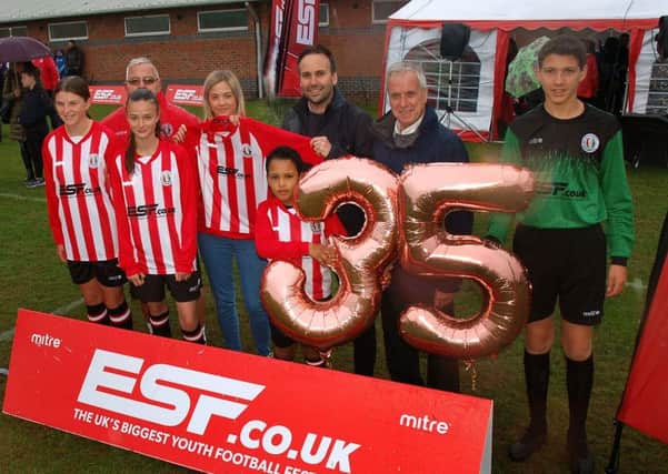 Sponsor Russell Young from ESF Events, hands over the new shirts to Rangers secretary Danielle Moore and players EMN-181019-172956002