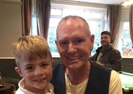 Football legend Paul Gascoigne poses with seven-year-old Harry during his visit to The Welby pub in Melton EMN-181023-144234001