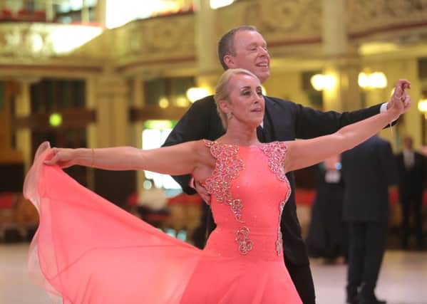 Long Field Academy head teacher Chris Haggett and Allison Kelham dance at the British Sequence Dancing Championships at the Winter Gardens in Blackpool EMN-181026-094207001