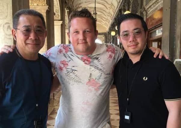 Melton fan Jonny McGrady (centre) pictured with Leicester City FC chairman, Vichai Srivaddhanaprabha (left), who was killed in a helicopter crash on Saturday, and his son, Aiyawatt, while on holiday in Venice earlier this year EMN-181029-163256001