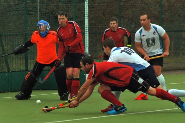 Pete Taylor battles for a breakthrough as Melton's men's first team were held to a frustrating draw EMN-181030-101847002