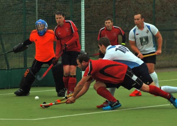 Pete Taylor battles for a breakthrough as Melton's men's first team were held to a frustrating draw EMN-181030-101847002