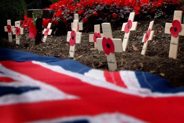 Special crosses for the Poppy Appeal planted in Melton's Memorial Gardens EMN-181029-112249001