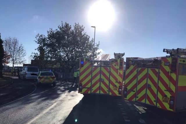 Emergency services on the scene following a road collision in Grange Drive, Melton EMN-181030-135328001