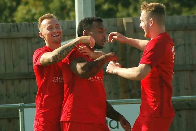 Josh Hill (left), Michael Reeve and Sam Thorpe (right) were all on target for Town in Saturday's win at Burton Park EMN-180511-094733002