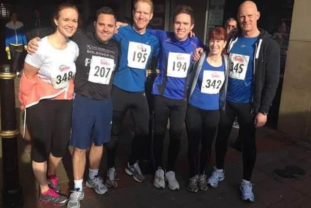 Ray Walker pictured at a running event with family members EMN-180511-155151001
