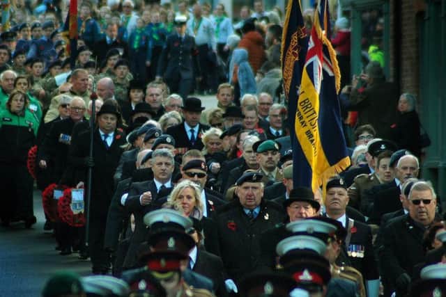 The parade makes it's way down Leicester Street on Remembrance Sunday last year EMN-180611-112155001
