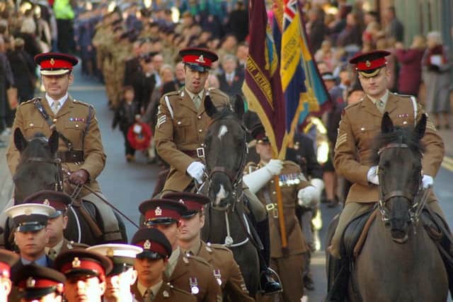 Mounted officers from the Defence Animal Centre, Melton, taking part in the 2016 Remembrance Day parade through Melton EMN-180611-112102001