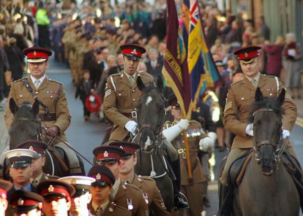 Mounted officers from the Defence Animal Centre, Melton, taking part in the 2016 Remembrance Day parade through Melton EMN-180611-112102001