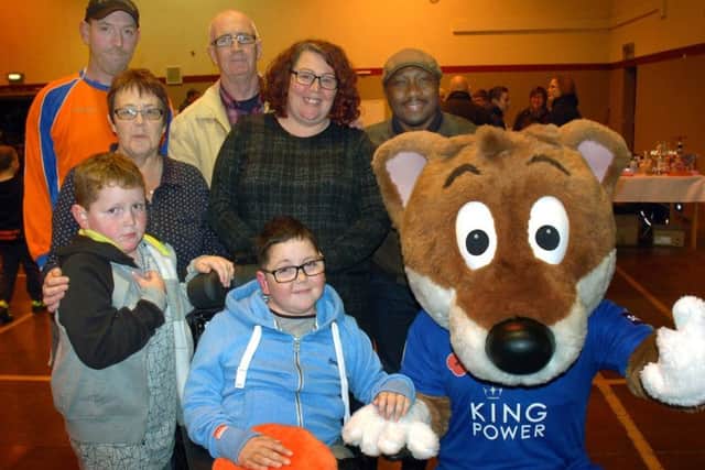 William Billingsley and family with Leicester City mascot Filbert Fox at a charity fundraiser at Asfordby FC EMN-180711-115628002