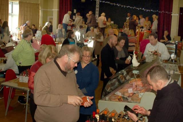 Food, drink and Christmas crafts attract the crowds to the village hall PHOTO: Tim Williams
