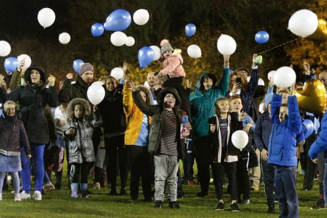 Spectators launch balloons at half-time for Will PICTURE: Phil James EMN-181114-085216002