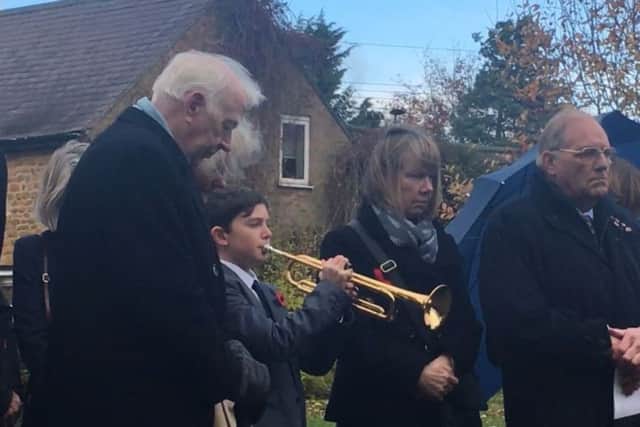 Ned Evans (11) plays the Last Post at a service of Remembrance at Pickwell on Sunday EMN-181114-101434001