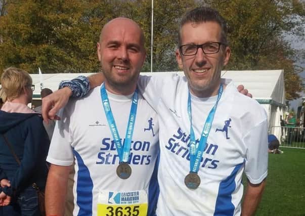 Alan Thompson (right) was first Vet45 runner home at the Leicester 5K Winter League EMN-181114-114145002