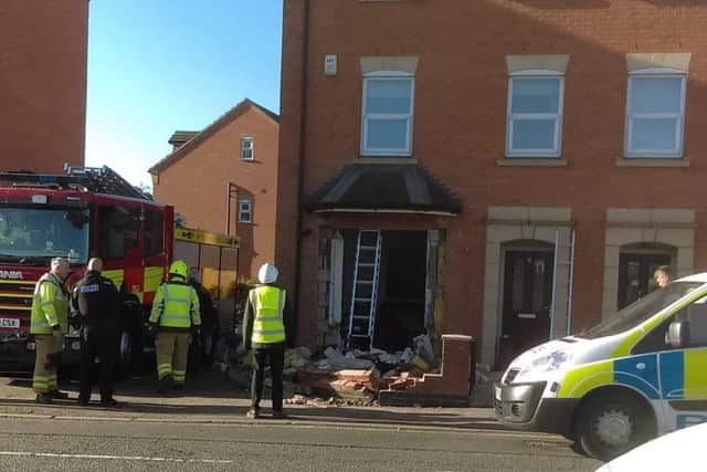 The scene in Nottingham Road, Melton, after a car crashed into a house on Tuesday EMN-181114-132440001