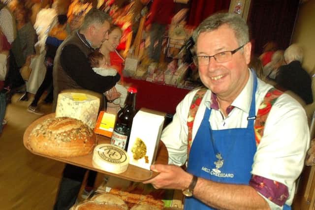 Tim Brown displays all the local food and drink available at the Melton Cheeseboard PHOTO: Tim Williams