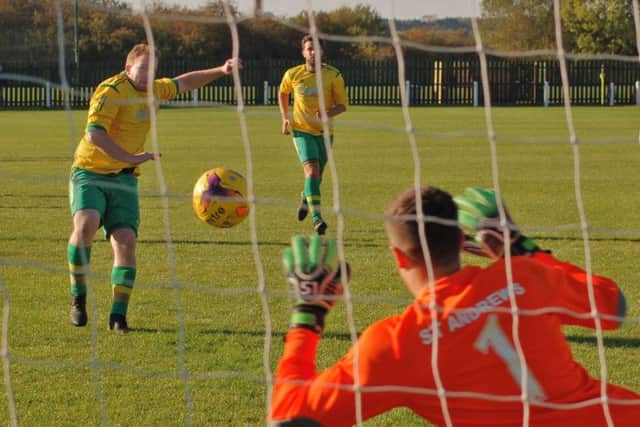 Ben Betteridge pulled one back for Holwell from the spot late on EMN-181127-095005002