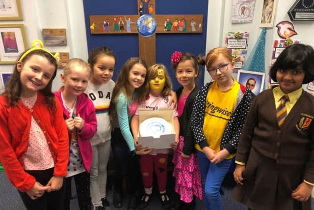 Tabitha Pritchard and fellow pupils at St Francis Primary School, Melton, during the cake sale she organised for a premature babies charity EMN-181121-171723001