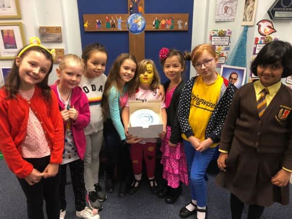 Tabitha Pritchard and fellow pupils at St Francis Primary School, Melton, during the cake sale she organised for a premature babies charity EMN-181121-171723001