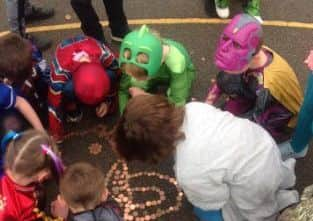 Children in Need - Making Pudsey portraits out of pennies at Old Dalby Primary School