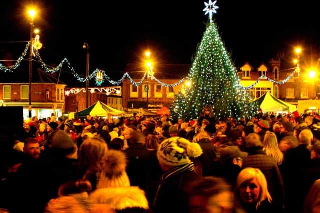 The Christmas tree and lights glow in the town centre PHOTO: Tim Williams