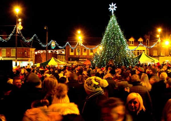 The Christmas tree and lights glow in the town centre PHOTO: Tim Williams