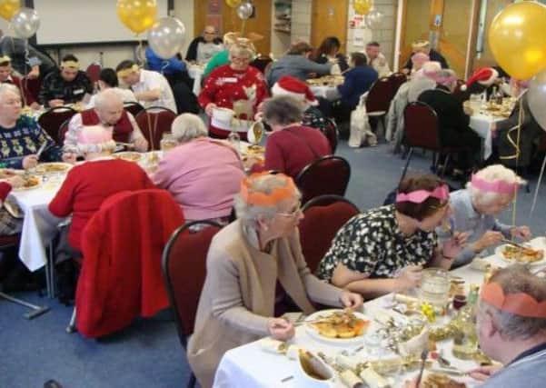 Guests enjoying Christmas Day lunch at Melton Mowbray Baptist Church PHOTO: Supplied