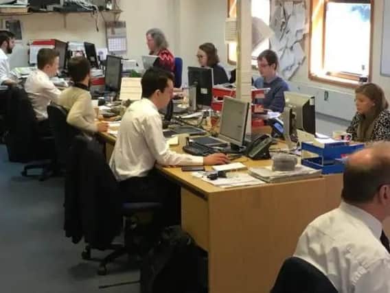 Journalists at work in one of our trusted local newsroom