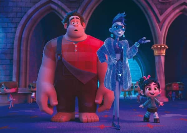 Ralph (voiced by John C. Reilly), Yesss (Taraji P. Henson) and Vanellope von Schweetz (Sarah Silverman) PHOTO: PA Photo/Disney