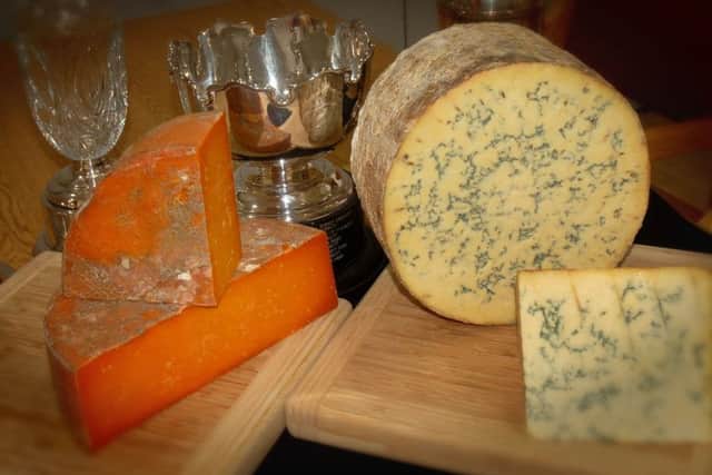 Long Clawson Dairy's champion cheeses from the 2018 Melton Fatstock Show, Blue Stilton and Rutland Red EMN-181218-180332001