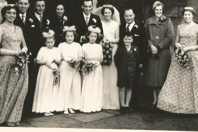 David and Ceris Turbayne, with family members, on their wedding day in Melton in 1958 EMN-181220-122819001