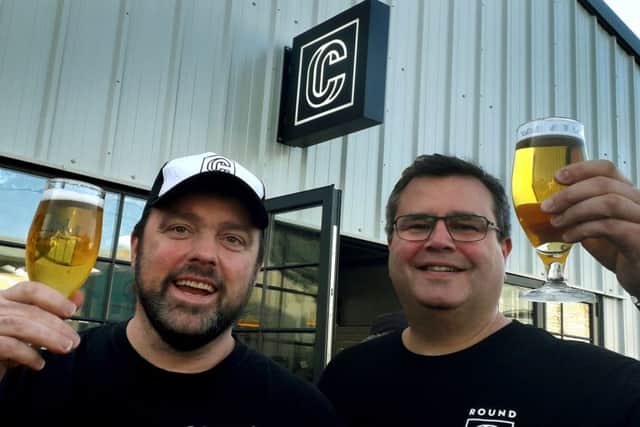 Round Corner Brewing CEO and co-founder Combie Cryan (left) with head brewer Colin Paige EMN-181221-115101001