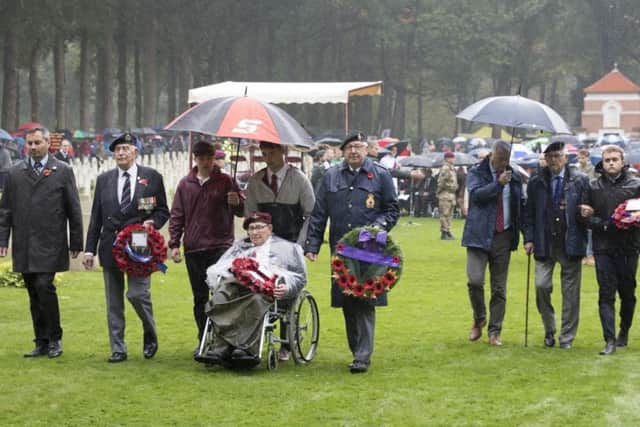 Dennis Collier (in the wheelchair), who fought at Arnhem with 156 Battalion, The Parachute Regiment, pictured at a war memorial event EMN-181227-131736001