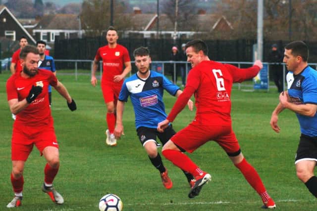 Tom Manship and Leon Fray combine to cut out a moment of danger against Thrapston EMN-181231-111821002