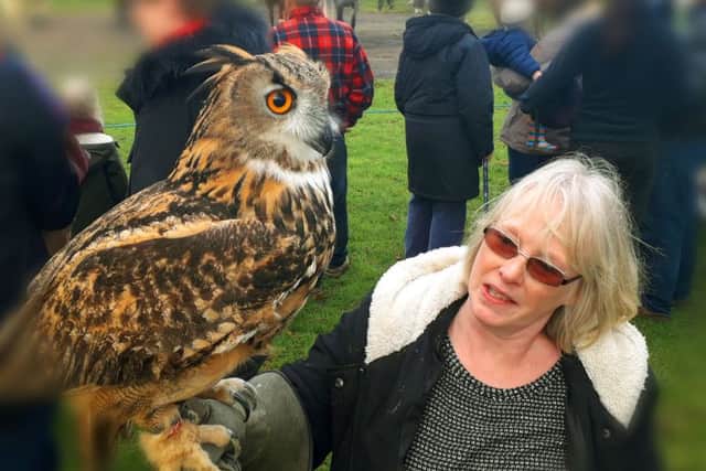 Sandra Watson with her eagle owl pictured at Tuesday's annual New Year hunt meet in Melton EMN-190201-093021001
