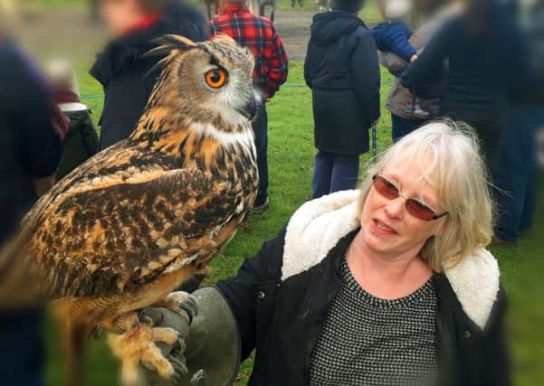 Sandra Watson with her eagle owl pictured at Tuesday's annual New Year hunt meet in Melton EMN-190201-093021001