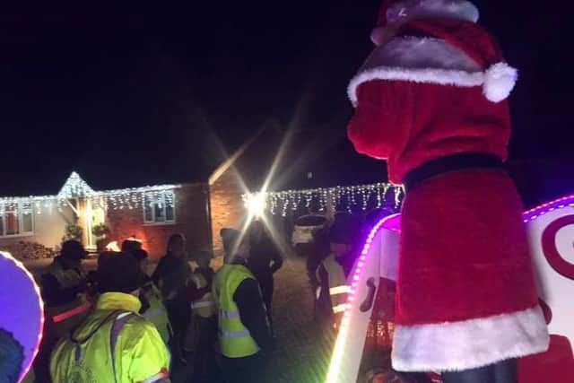 Santa out and about with Lions helpers PHOTO: @VOBlions