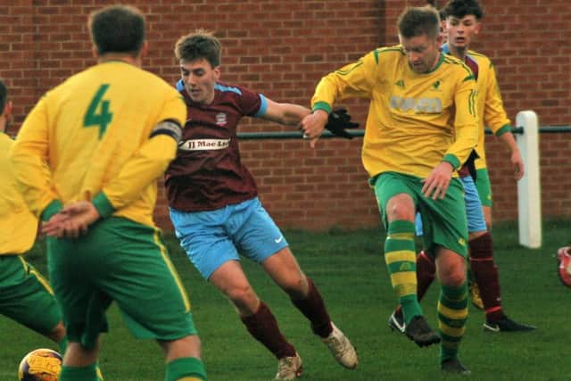 Midfielder Michael Stevenson was called back into central defence with half of the regular back four missing EMN-190801-085759002