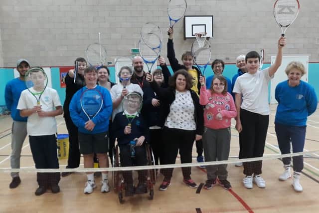 Birchwood pupils with Melton Mowbray Tennis Club coaches and helpers EMN-190801-170532002