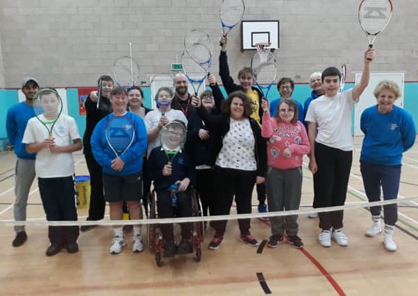 Birchwood pupils with Melton Mowbray Tennis Club coaches and helpers EMN-190801-170532002